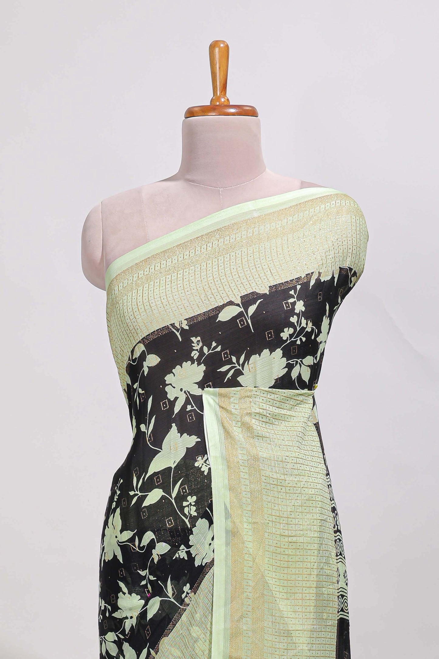 Black checked floral motifs chiffon saree with self zari border and contrast blouse