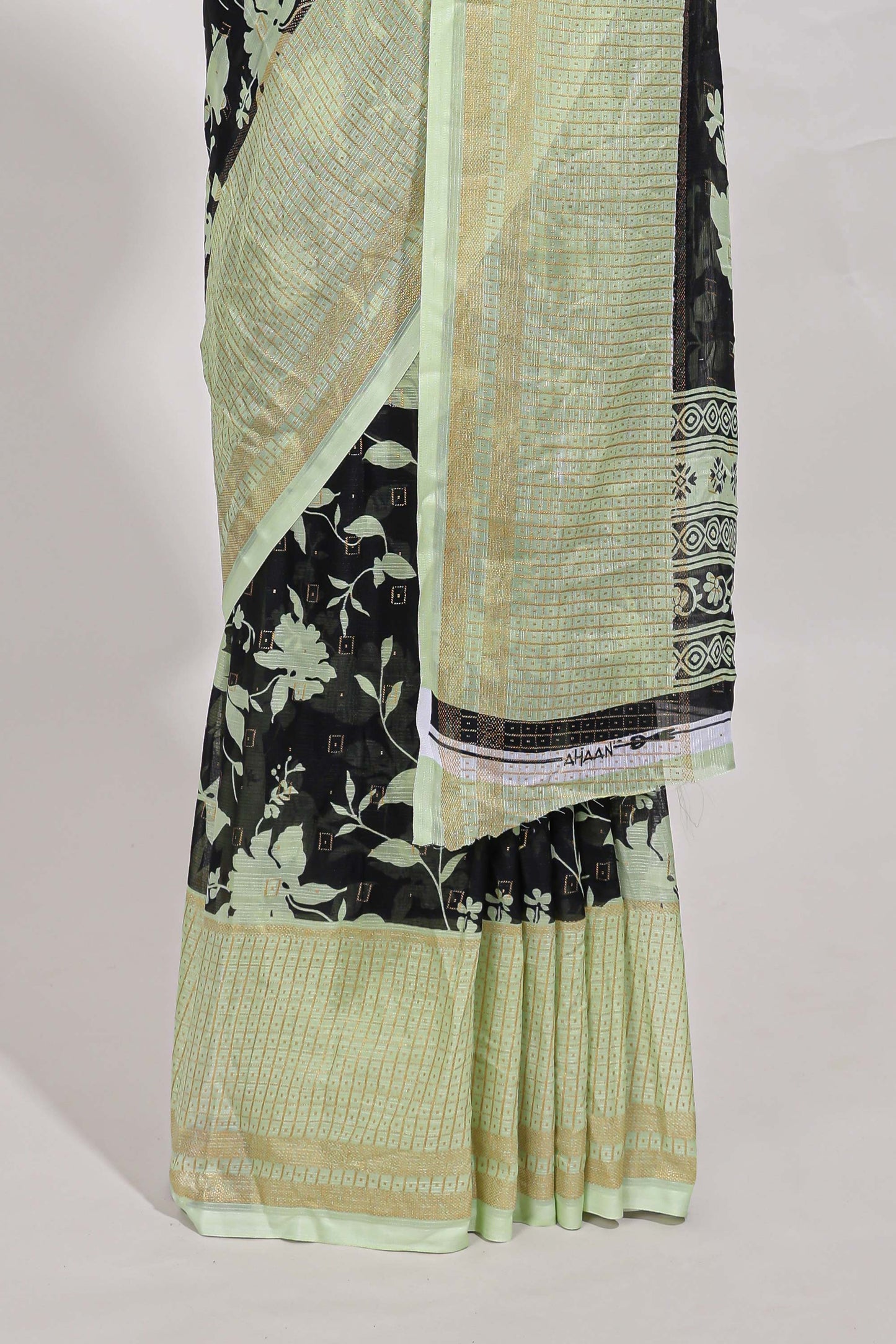 Black checked floral motifs chiffon saree with self zari border and contrast blouse