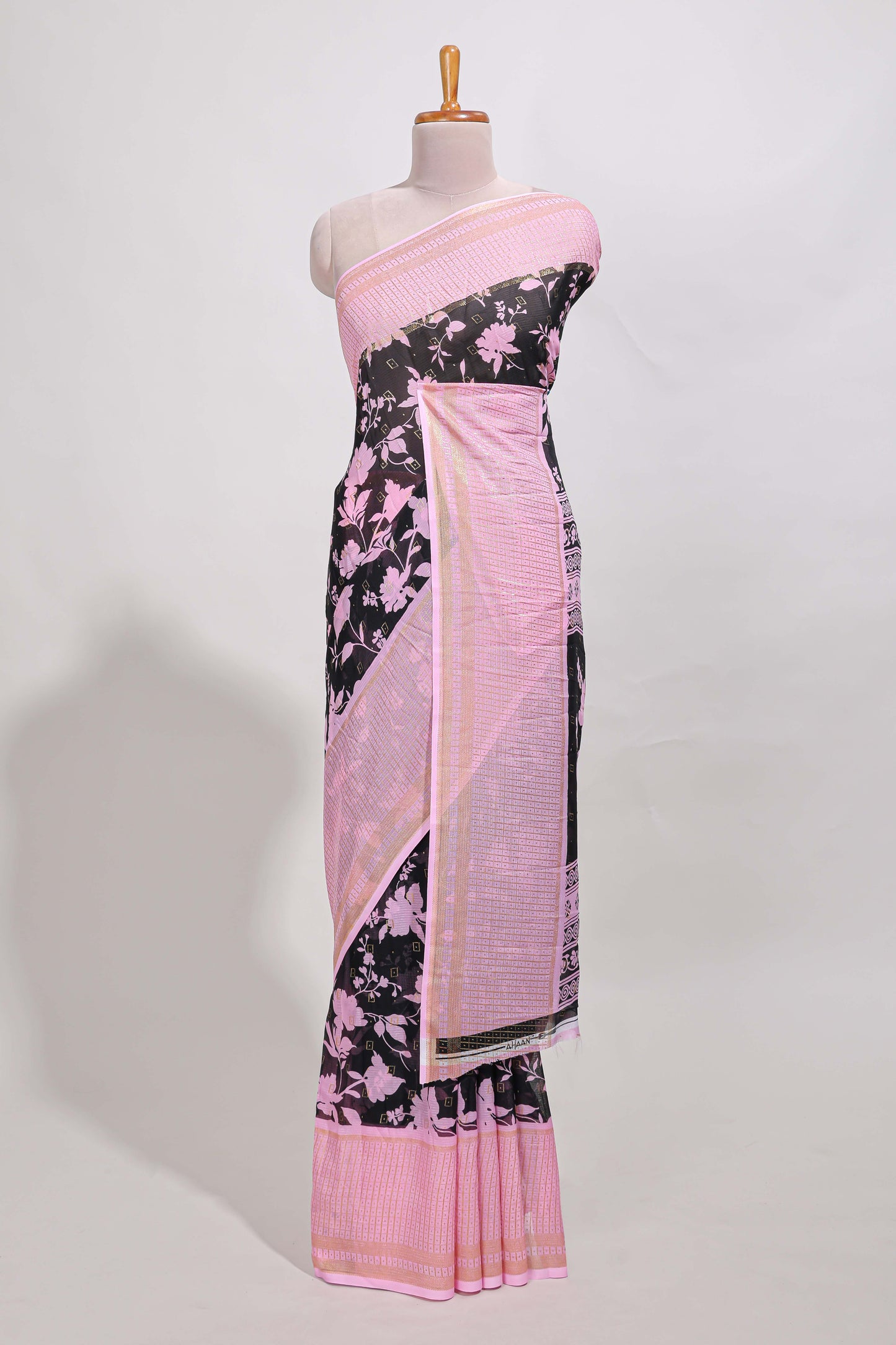 Black checked floral motifs chiffon saree with self zari border and contrast blouse