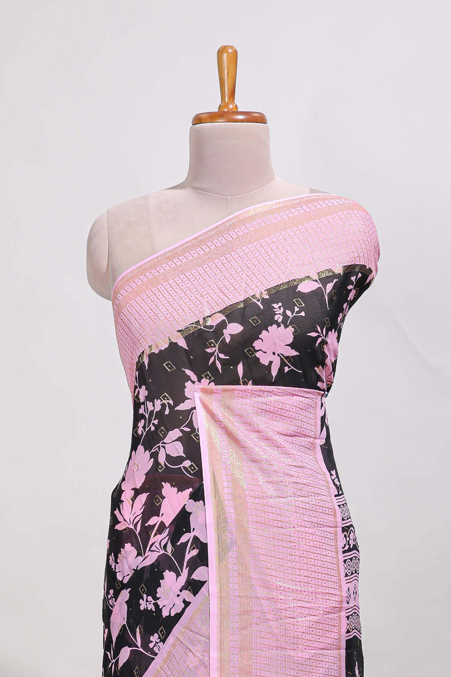 Black checked floral motifs chiffon saree with self zari border and contrast blouse