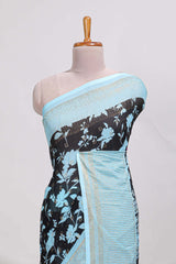 Blackwith blue checked floral motifs chiffon saree with self zari border and contrast blouse