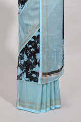 Blackwith blue checked floral motifs chiffon saree with self zari border and contrast blouse