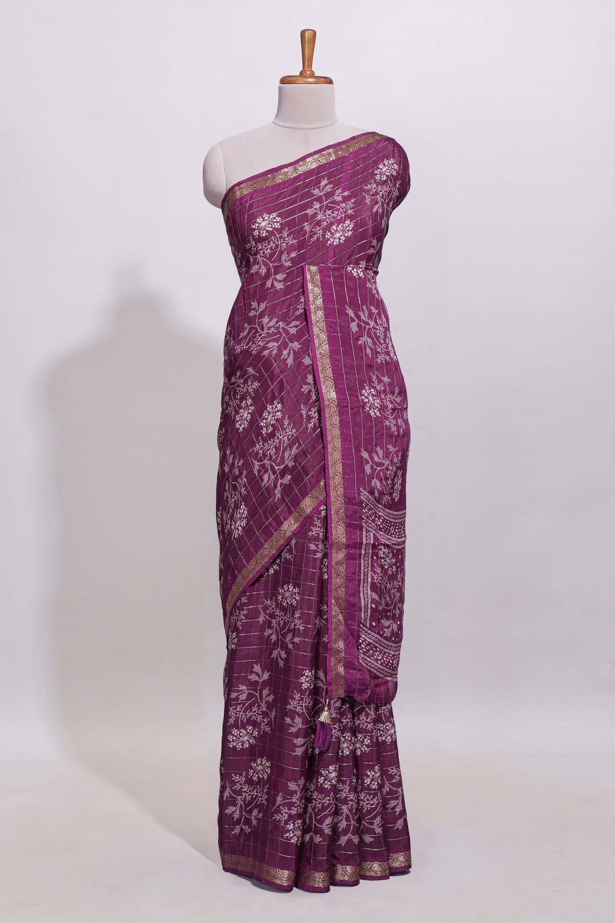 Deep plum checked with floral motifs chiffon saree with self zari border and matching blouse