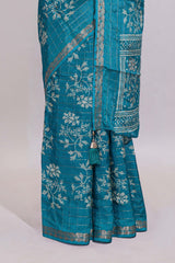 Teal blue checked with floral motifs chiffon saree with self zari border and matching blouse