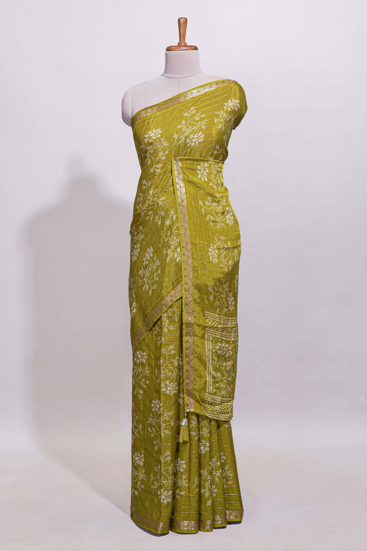 Olive green checked with floral motifs chiffon saree with self zari border and matching blouse
