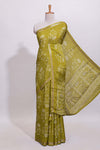 Olive green checked with floral motifs chiffon saree with self zari border and matching blouse