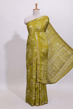 Olive green checked with floral motifs chiffon saree with self zari border and matching blouse