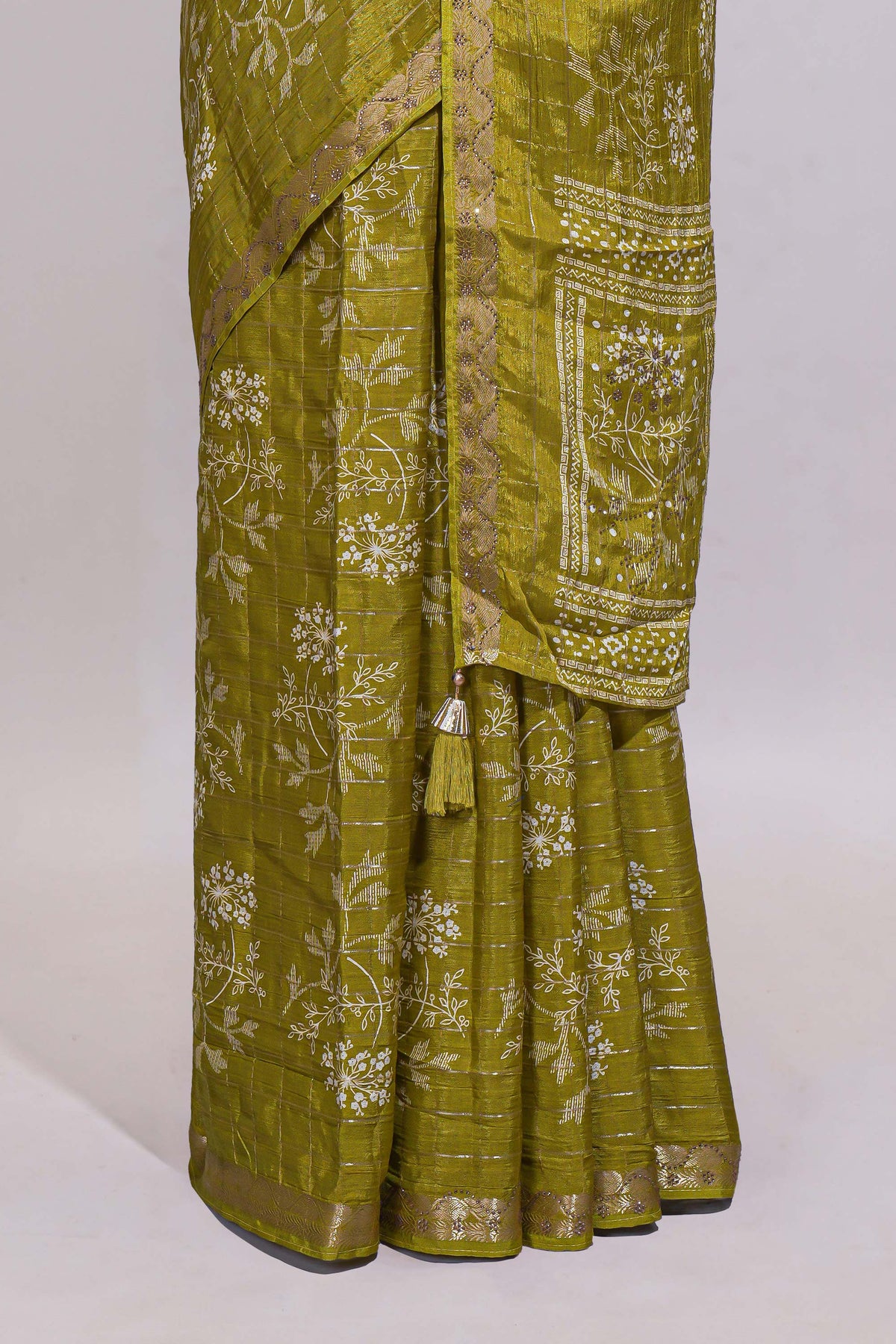 Olive green checked with floral motifs chiffon saree with self zari border and matching blouse