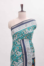 Turquoise green kalamkari style chanderi cotton saree with contrast border and blouse