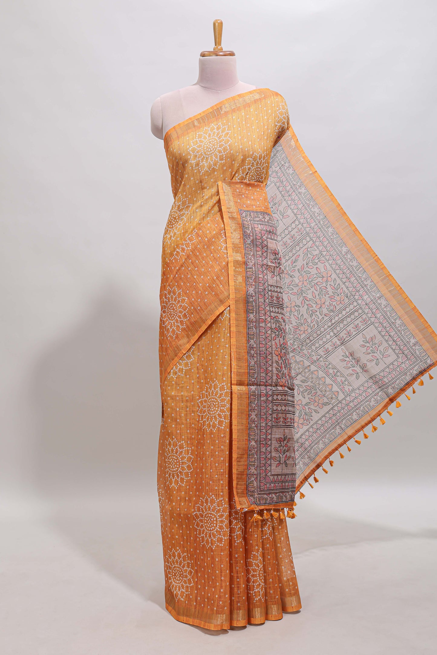 Mustard bhandhini style floral design chanderi cotton saree with self zari border and contrast printed blouse