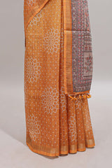 Mustard bhandhini style floral design chanderi cotton saree with self zari border and contrast printed blouse