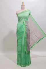 Green bhandhini style floral design chanderi cotton saree with self zari border and contrast printed blouse