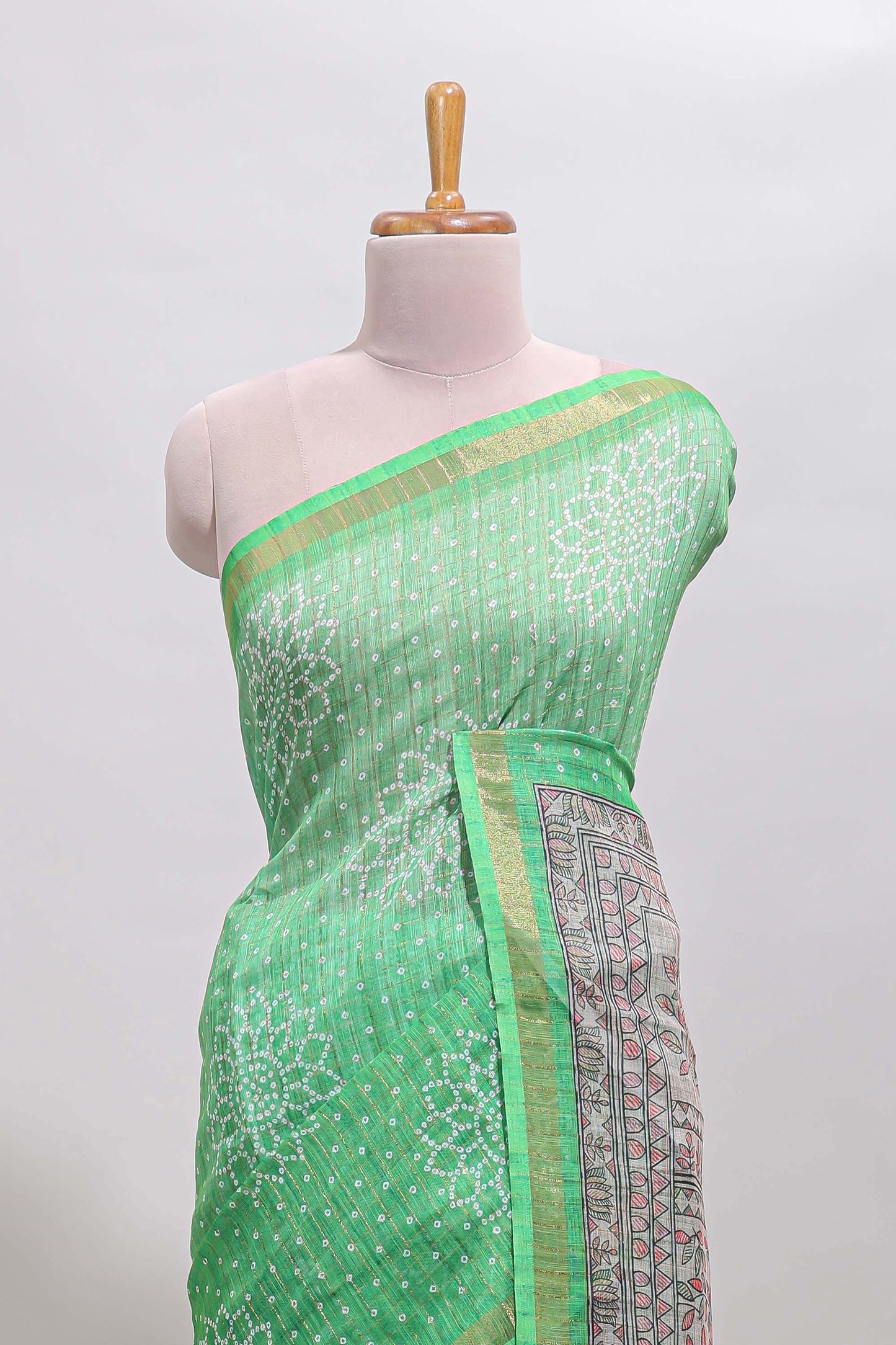 Green bhandhini style floral design chanderi cotton saree with self zari border and contrast printed blouse