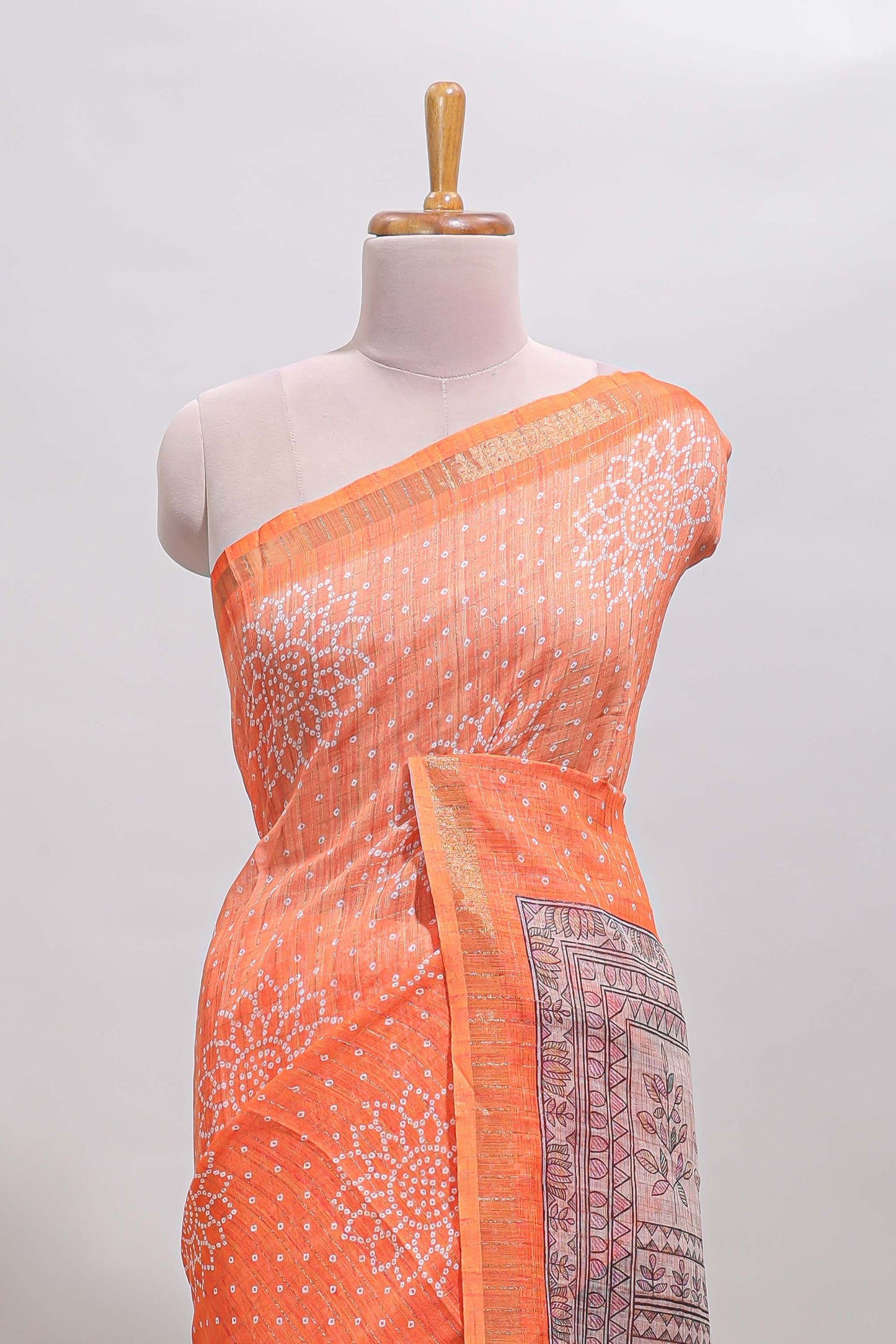Orange bhandhini style floral design chanderi cotton saree with self zari border and contrast printed blouse