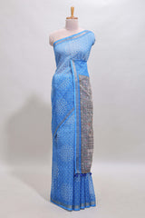 Blue bhandhini style floral design chanderi cotton saree with self zari border and contrast printed blouse