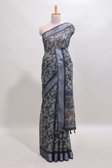 Dark sea green geometric design chanderi cotton saree with contrast zari border and printed blouse