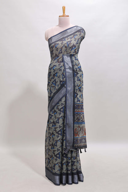 Dark sea green geometric design chanderi cotton saree with contrast zari border and printed blouse