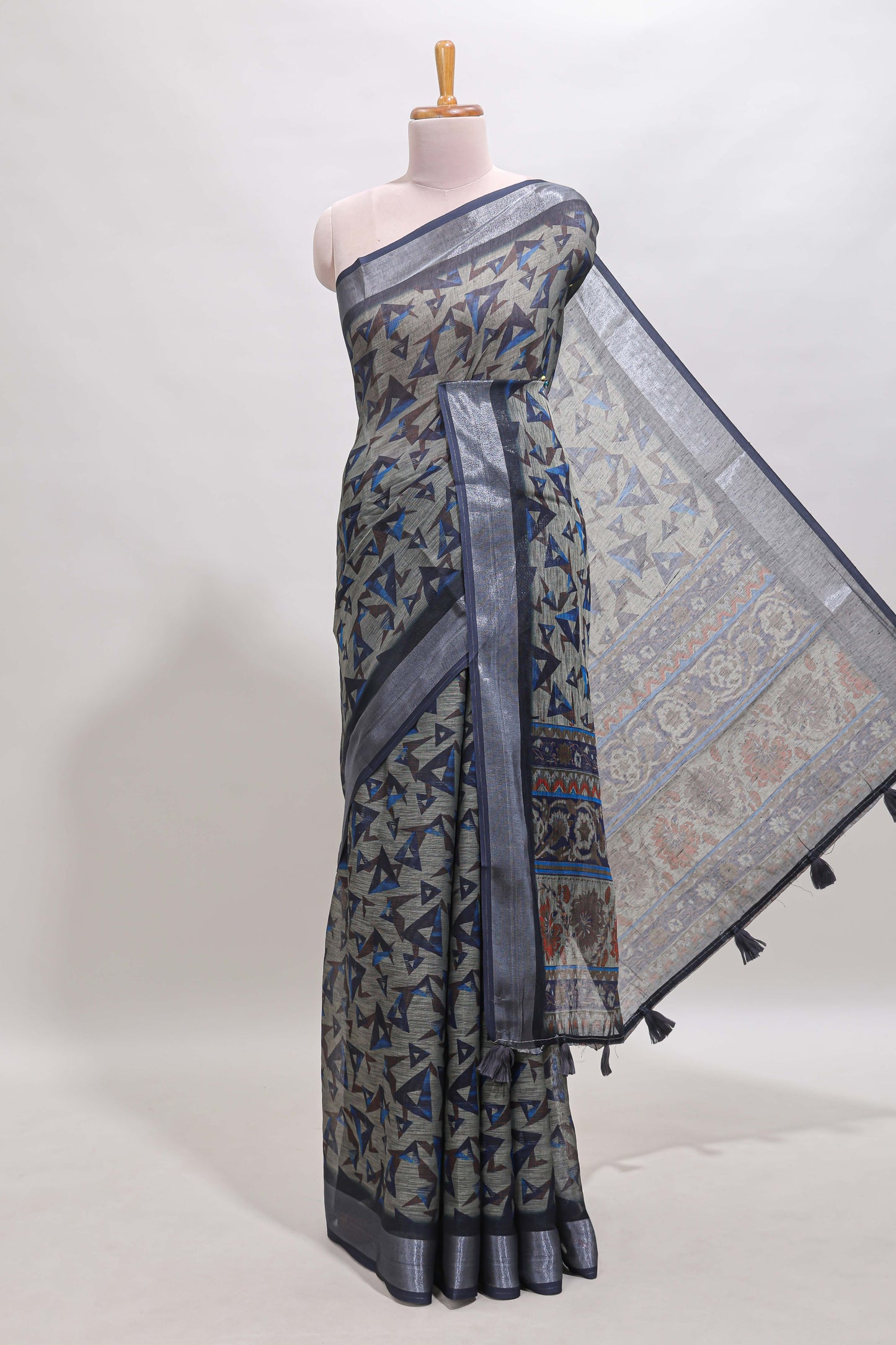 Dark sea green geometric design chanderi cotton saree with contrast zari border and printed blouse