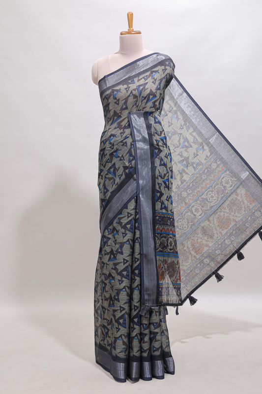 Dark sea green geometric design chanderi cotton saree with contrast zari border and printed blouse