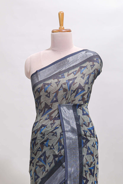 Dark sea green geometric design chanderi cotton saree with contrast zari border and printed blouse