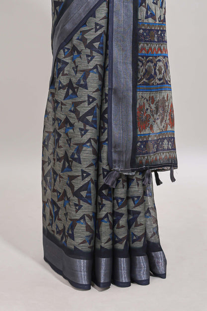 Dark sea green geometric design chanderi cotton saree with contrast zari border and printed blouse