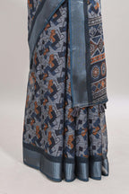 Grey geometric design chanderi cotton saree with contrast zari border and printed blouse