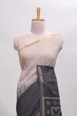 Cream & black dual shade checked chanderi cotton saree with self zari border and blouse