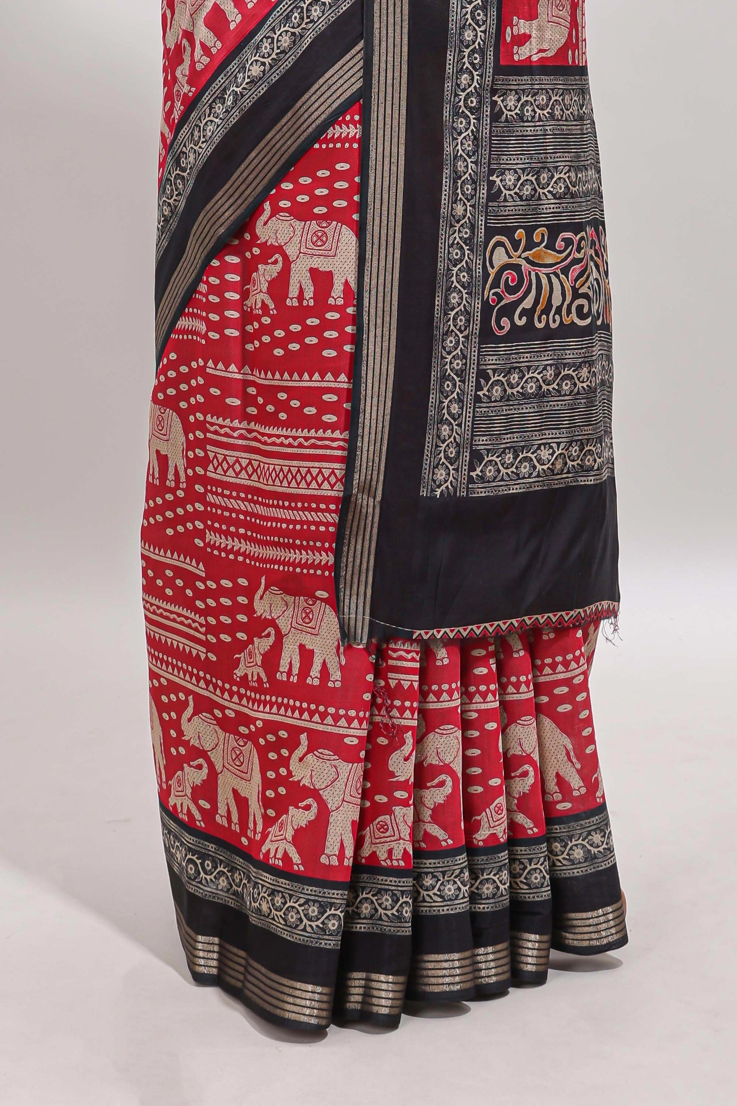 Red geometric & elephant motif chanderi cotton saree with contrast border and chevron blouse