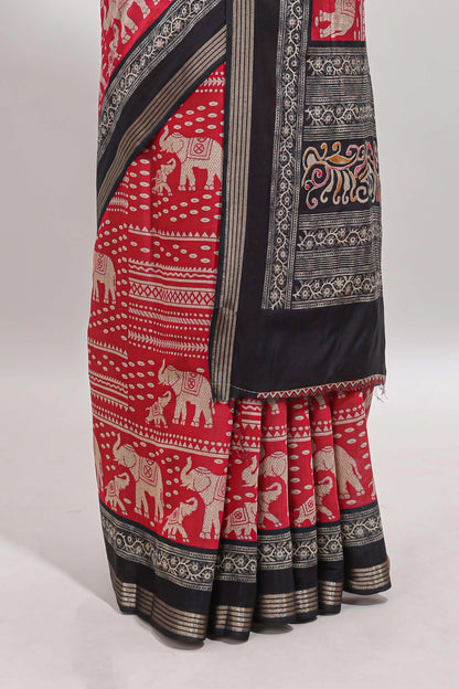 Red geometric & elephant motif chanderi cotton saree with contrast border and chevron blouse