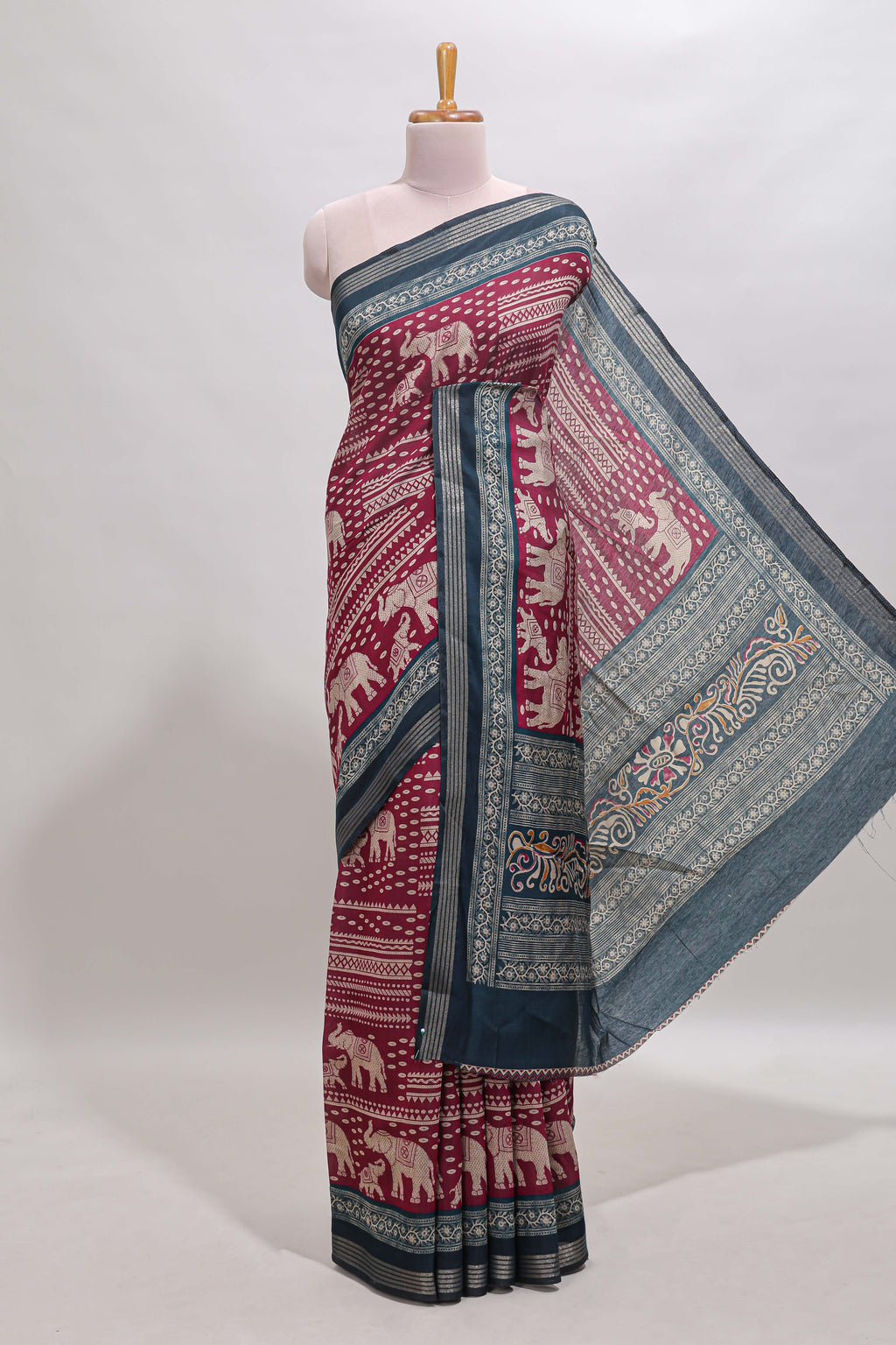 Maroon geometric & elephant motif chanderi cotton saree with contrast border and chevron blouse