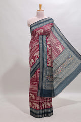 Maroon geometric & elephant motif chanderi cotton saree with contrast border and chevron blouse
