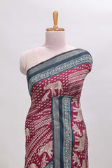 Maroon geometric & elephant motif chanderi cotton saree with contrast border and chevron blouse