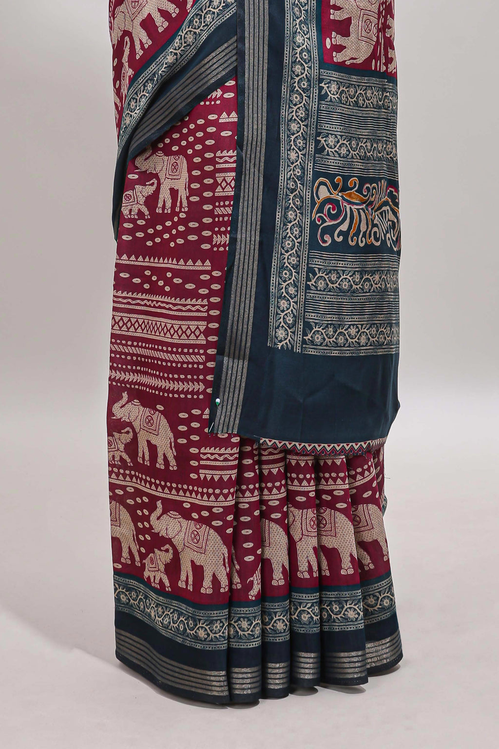 Maroon geometric & elephant motif chanderi cotton saree with contrast border and chevron blouse