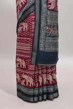 Maroon geometric & elephant motif chanderi cotton saree with contrast border and chevron blouse
