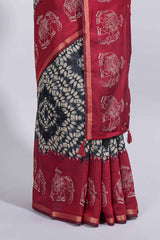 Black Chanderi cotton saree with elephant motifs tie and dye effect patterns and contrast zari border along with printed blouse