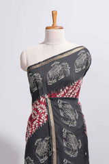 Maroon Chanderi cotton saree with elephant motifs tie and dye effect patterns and contrast zari border along with printed blouse