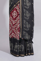 Maroon Chanderi cotton saree with elephant motifs tie and dye effect patterns and contrast zari border along with printed blouse