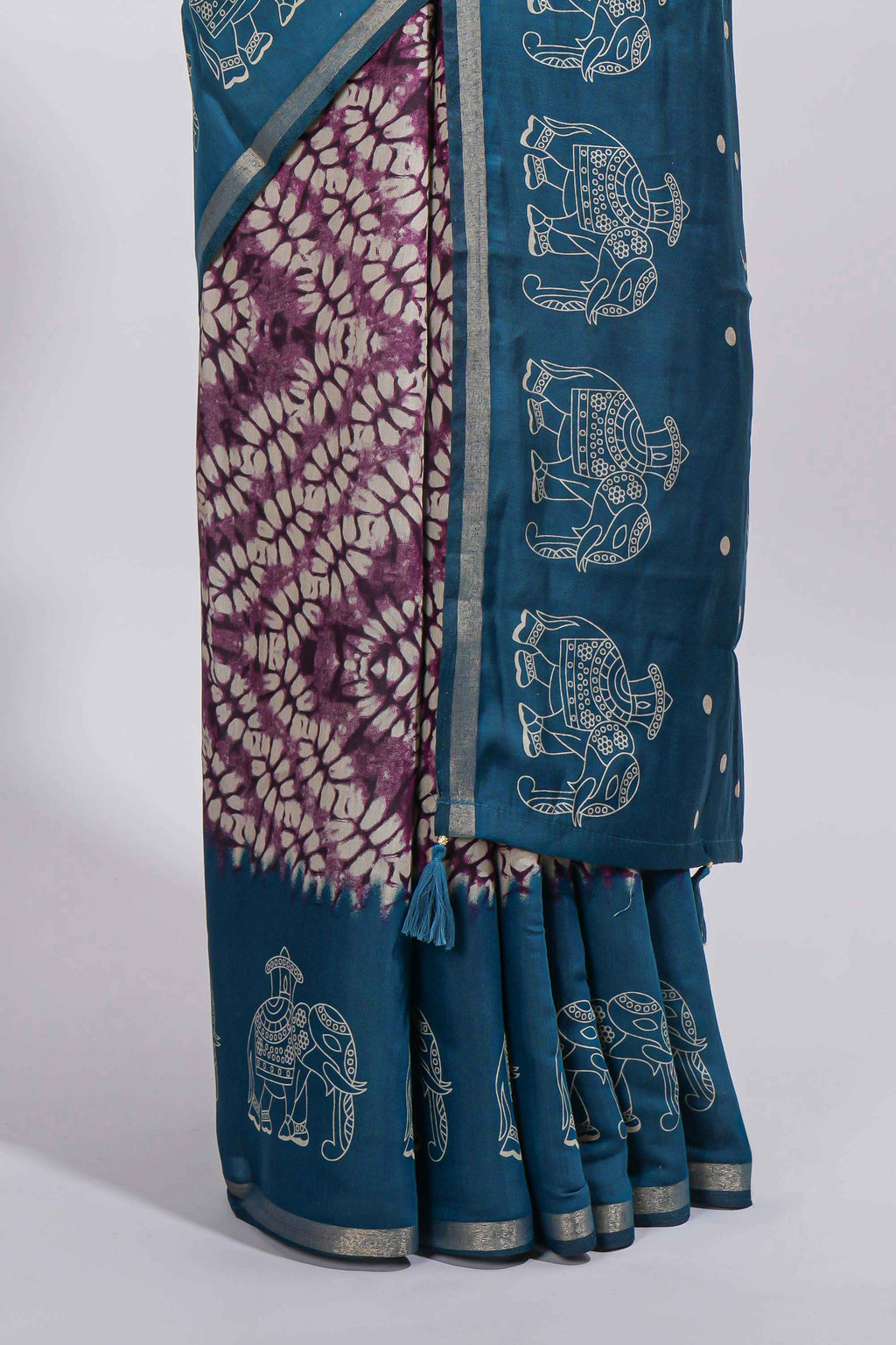 Purple Chanderi cotton saree with elephant motifs tie and dye effect patterns and contrast zari border along with printed blouse