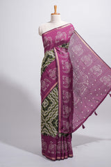 Dark green Chanderi cotton saree with elephant motifs tie and dye effect patterns and contrast zari border along with printed blouse