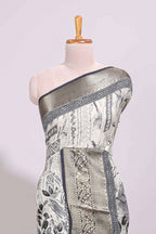 Cream floral design Chanderi cotton saree with contrast zari border and zari motifs blouse