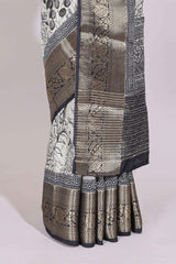 Cream floral design Chanderi cotton saree with contrast zari border and zari motifs blouse