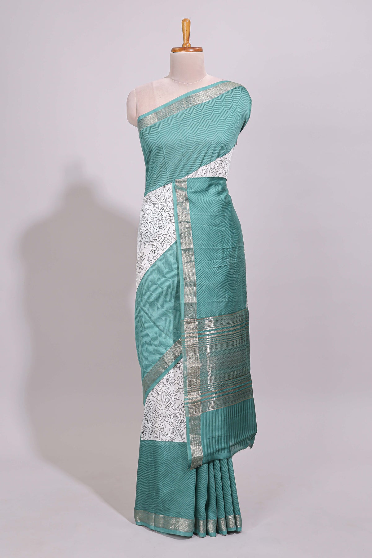 White floral design Chanderi cotton saree with contrast turquoise green zari border and floral print blouse