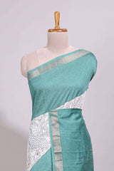 White floral design Chanderi cotton saree with contrast turquoise green zari border and floral print blouse