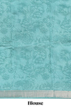 White floral design Chanderi cotton saree with contrast turquoise green zari border and floral print blouse