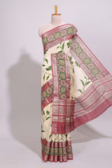 Cream leaf design chanderi cotton saree with contrast bentex zari border andprinted blouse