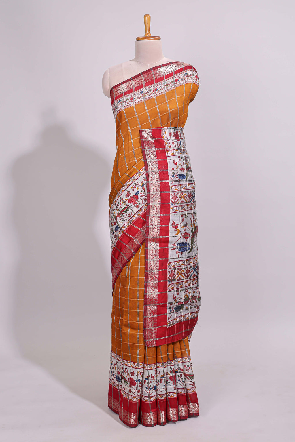 Mustard checked bottom floral design chanderi cotton saree with contrast border and checked blouse