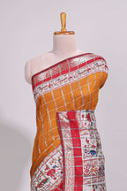 Mustard checked bottom floral design chanderi cotton saree with contrast border and checked blouse