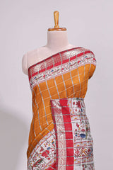 Mustard checked bottom floral design chanderi cotton saree with contrast border and checked blouse