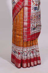 Mustard checked bottom floral design chanderi cotton saree with contrast border and checked blouse