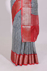 Cream geometric print design chanderi cotton saree with contrast border and striped blouse